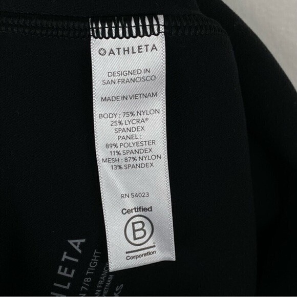 Athleta Salutation Stash Pocket Twist 7/8 Leggings Black Size XXS - Picture 9 of 9